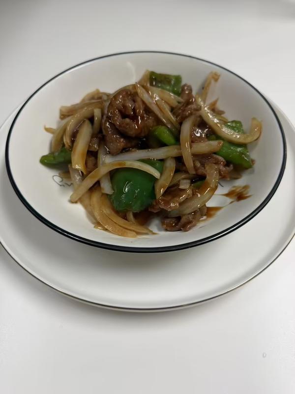 121. Pepper Steak w. Onion